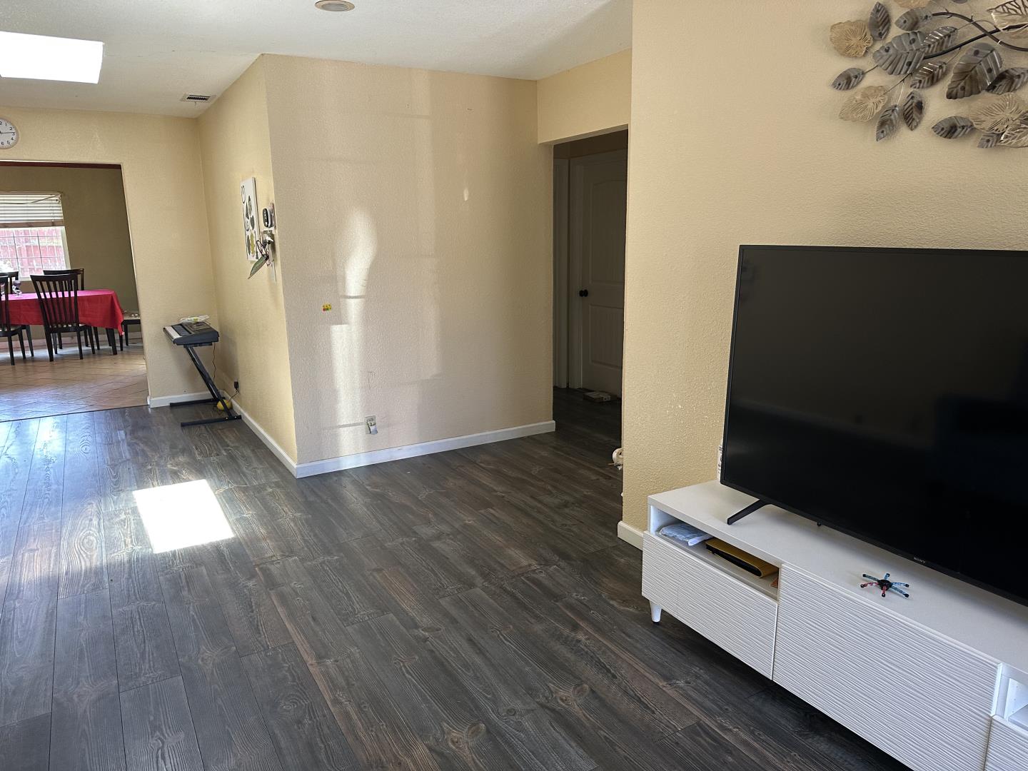 544 Sequoia Road Hayward, CA 94541 - Photo 6 of 34 a living room with hard wood floors and a flat screen tv