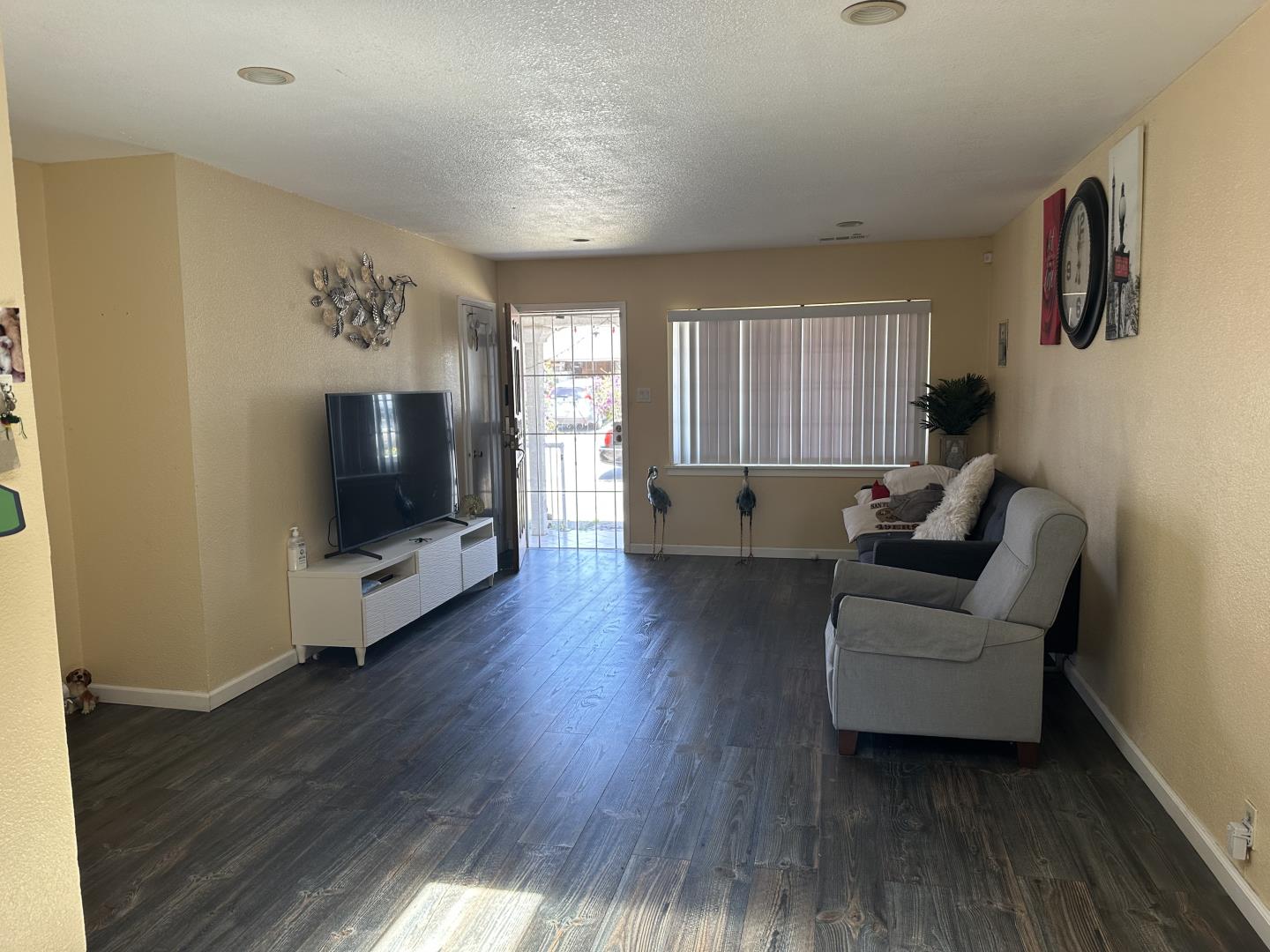 544 Sequoia Road Hayward, CA 94541 - Photo 8 of 34 a living room with furniture and a flat screen tv