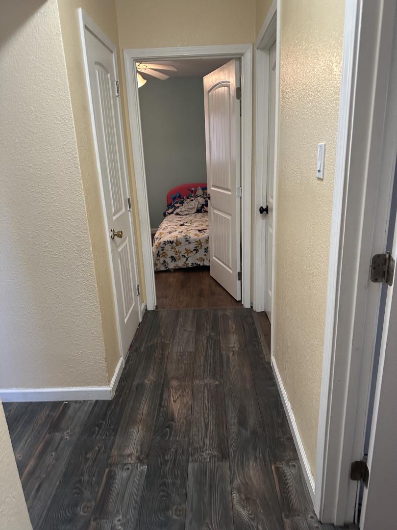 544 Sequoia Road Hayward, CA 94541 - Photo 9 of 34 a view of a hallway view with wooden floor and bedroom view