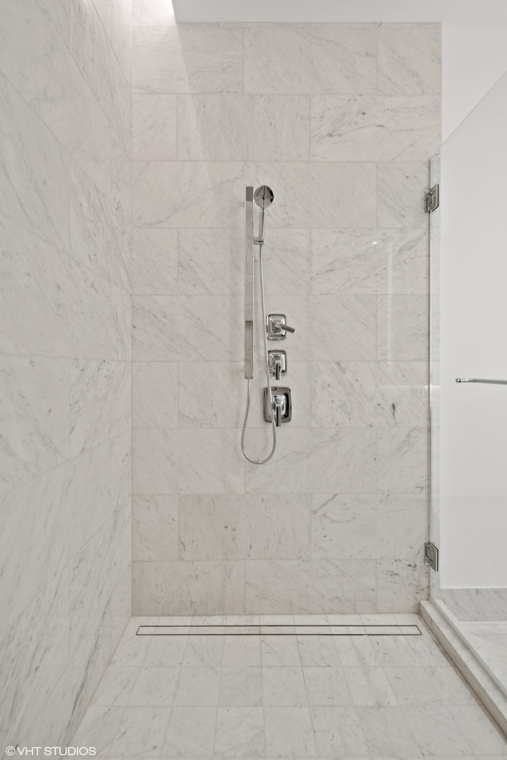 363 East Wacker Drive, Unit 1802 Chicago, IL 60601 - Photo 13 of 15 a bathroom with a shower
