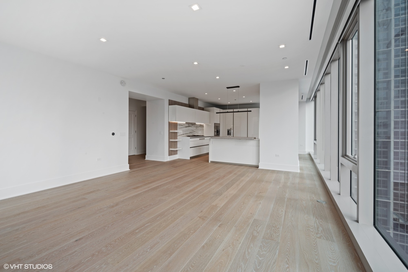 363 East Wacker Drive, Unit 1802 Chicago, IL 60601 - Photo 6 of 15 a view of empty room with wooden floor