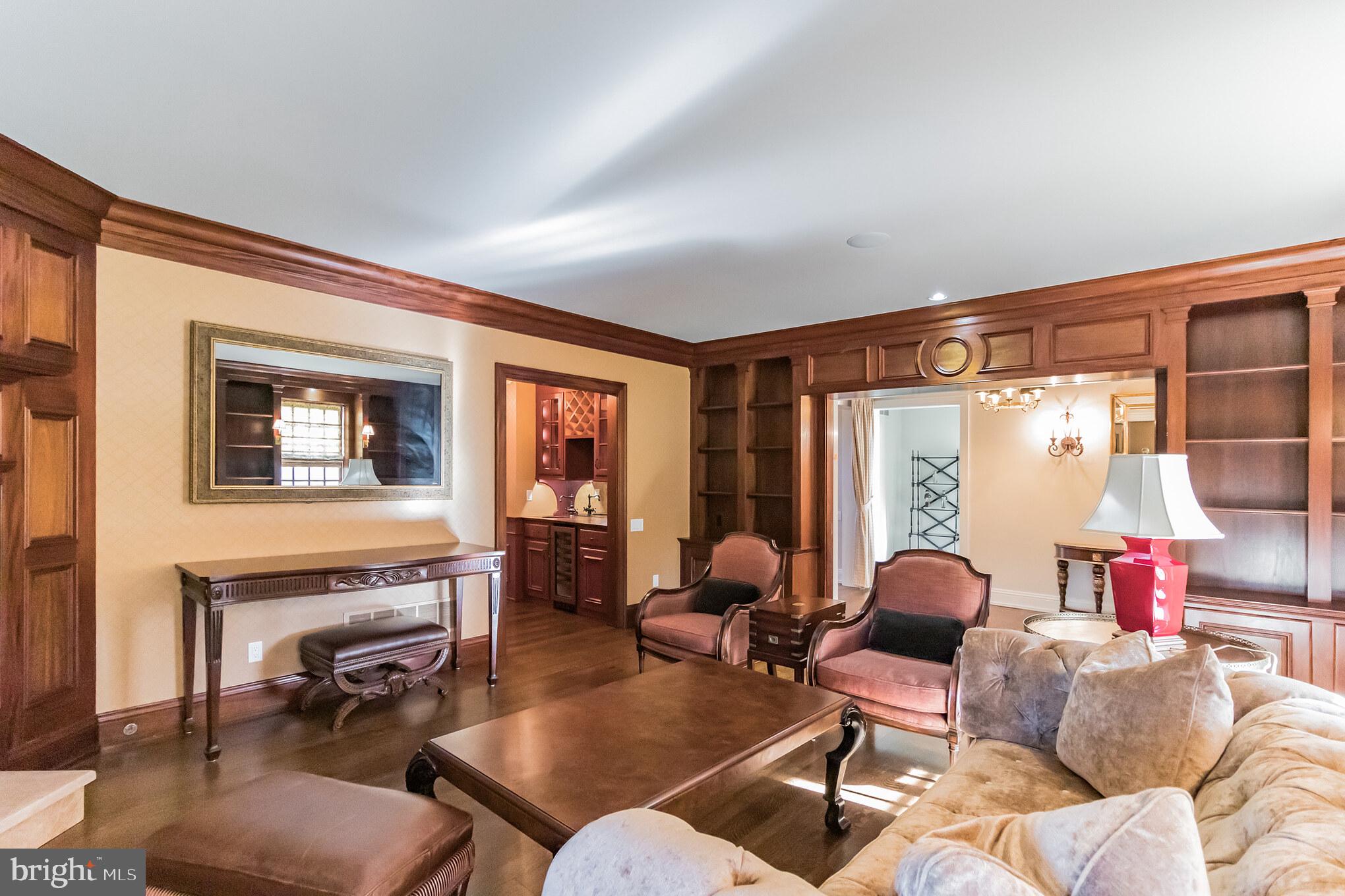 1911 Stone Ridge Lane Villanova, PA 19085 - Photo 9 of 32 a living room with furniture and a large window