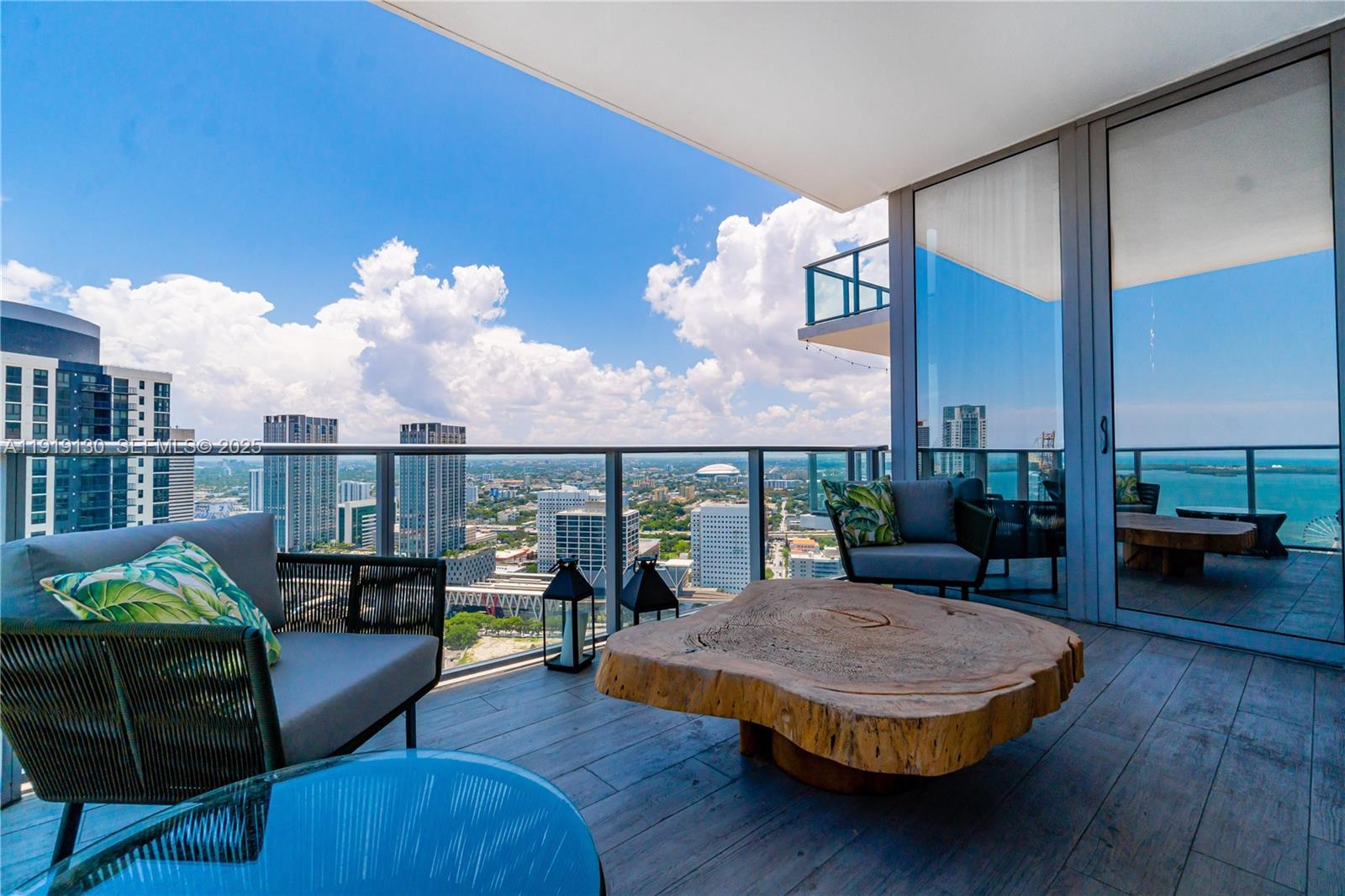 851 Northeast 1st Avenue, Unit 3511 Miami, FL 33132 - Photo 12 of 53 a living room with furniture and a fireplace