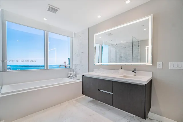 a bathroom with a toilet and a sink