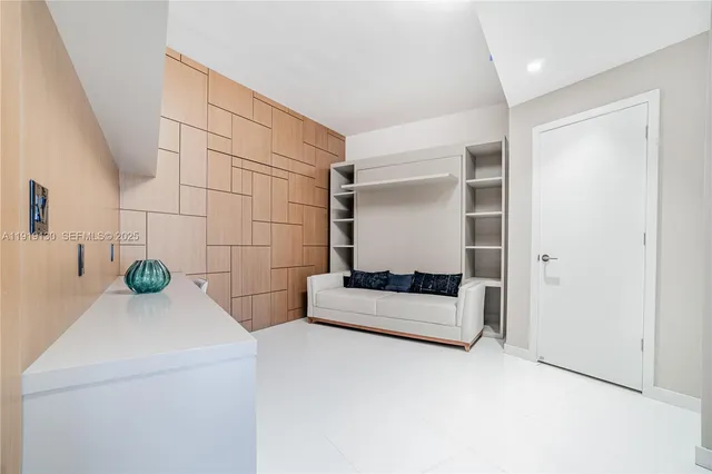 a view of a hallway with elevator