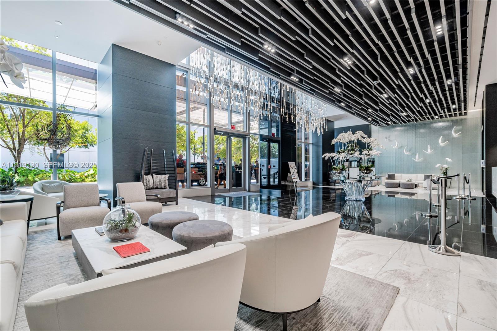 851 Northeast 1st Avenue, Unit 3511 Miami, FL 33132 - Photo 40 of 53 a living room with furniture and a large window