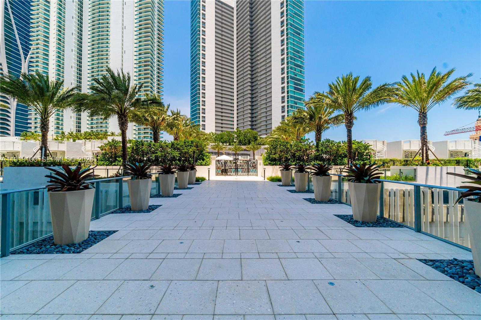 851 Northeast 1st Avenue, Unit 3511 Miami, FL 33132 - Photo 44 of 53 a house with palm trees