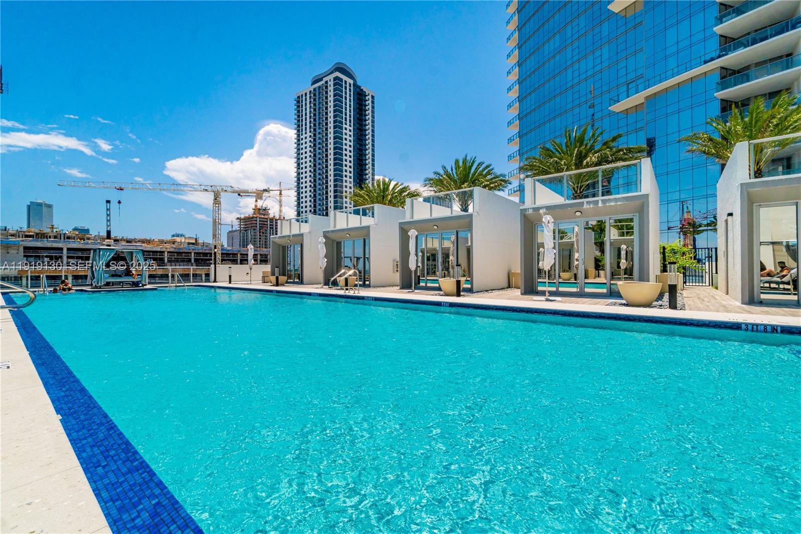 851 Northeast 1st Avenue, Unit 3511 Miami, FL 33132 - Photo 47 of 53 a view of a house with a backyard porch and sitting area