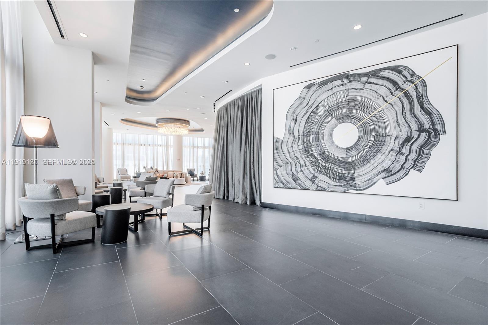 851 Northeast 1st Avenue, Unit 3511 Miami, FL 33132 - Photo 48 of 53 a living room with furniture and a large window