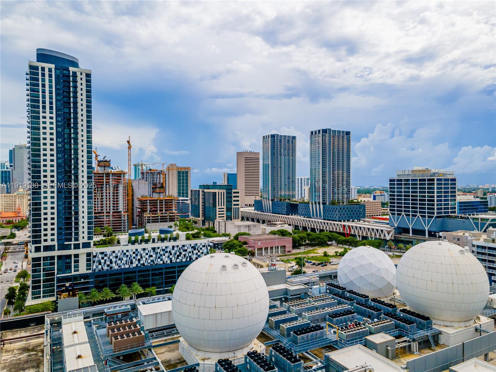 851 Northeast 1st Avenue, Unit 3511 Miami, FL 33132 - Photo 49 of 53 a view of roof deck with sitting area