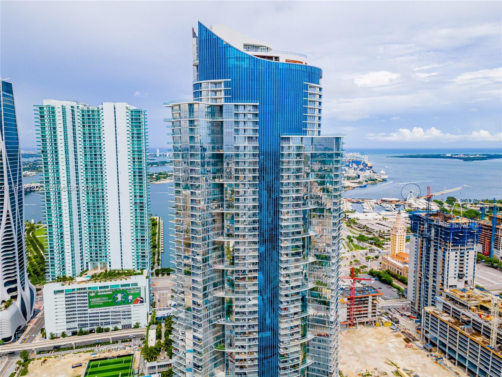 851 Northeast 1st Avenue, Unit 3511 Miami, FL 33132 - Photo 50 of 53 a view of a city with tall buildings