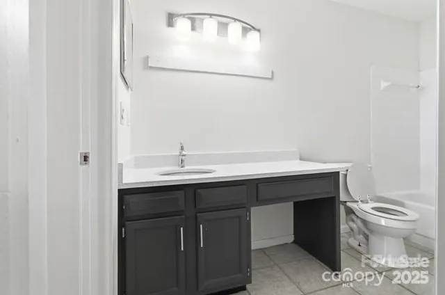 a bathroom with a sink and a toilet