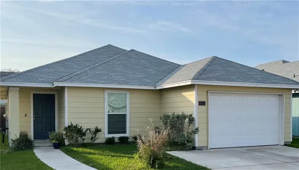 front view of house with a yard