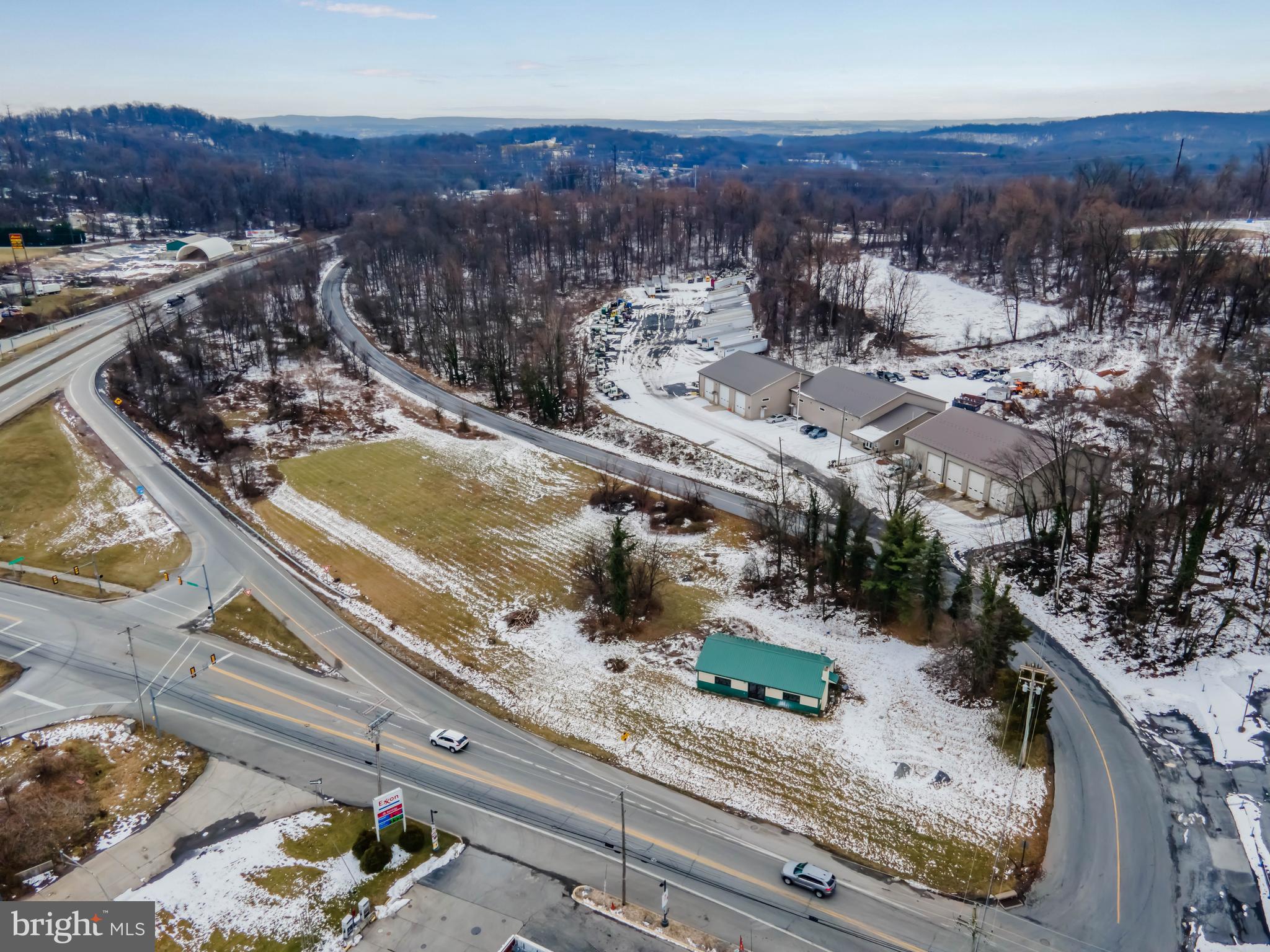 Lewisberry Road Lewisberry, PA 17339 - Photo 2 of 9 a view of a backyard with a mountain