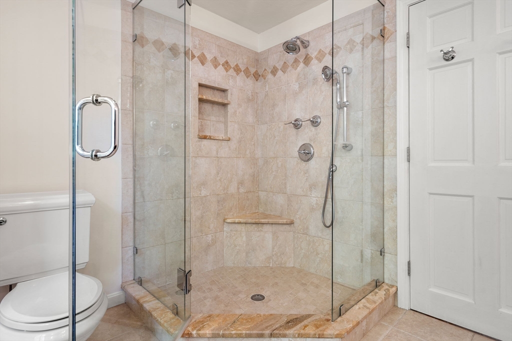28 Charles Road Groton, MA 01450 - Photo 23 of 42 a bathroom with a shower and toilet