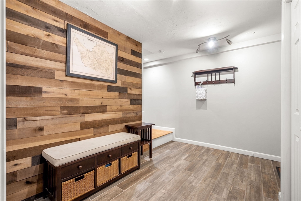 28 Charles Road Groton, MA 01450 - Photo 31 of 42 a view of a room with wooden floor and windows