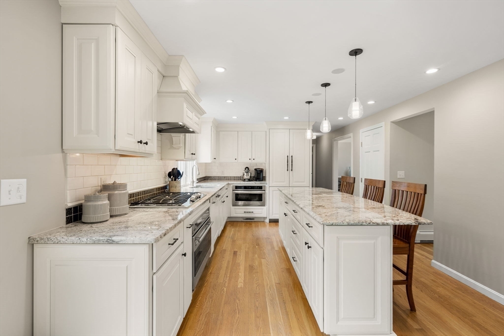 28 Charles Road Groton, MA 01450 - Photo 6 of 42 a open kitchen with stainless steel appliances granite countertop a lot of counter space and a sink