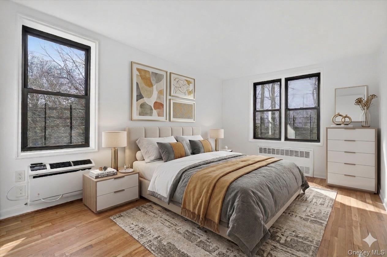 5235 Post Road, Unit 5A Bronx, NY 10471 - Photo 19 of 23 a bedroom with a bed and a window