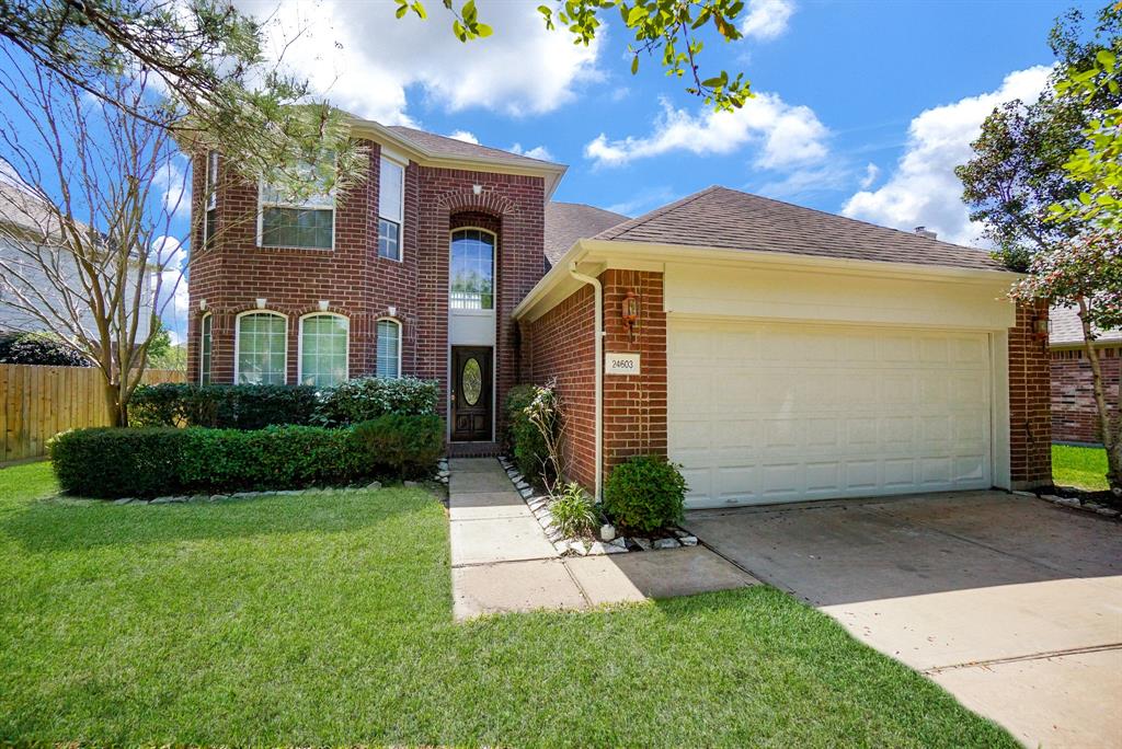 Welcome to 24603 Bell Canyon Ln - Beautiful 4 Bedroom, 2 and 1/2 bath home on a quiet street in the highly desirable CINCO RANCH subdivision.