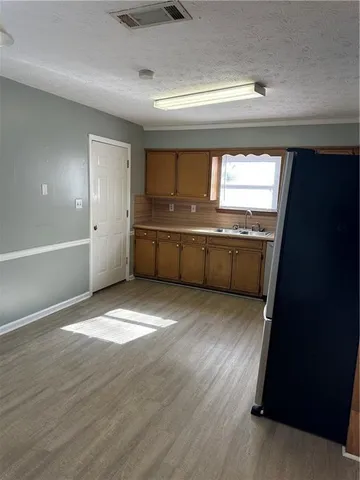 a room with window and ceiling fan