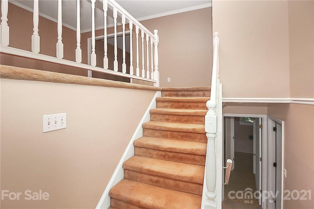 2101 Stallings Road Harrisburg, NC 28075 - Photo 3 of 45 a view of entryway with staircase