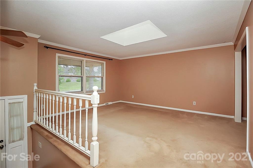 2101 Stallings Road Harrisburg, NC 28075 - Photo 4 of 45 an empty room with windows