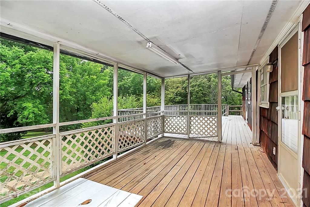 2101 Stallings Road Harrisburg, NC 28075 - Photo 31 of 45 a view of balcony with wooden floor