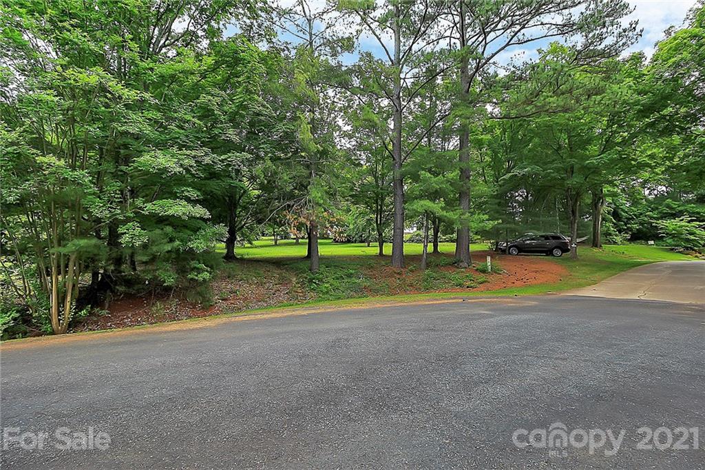 2101 Stallings Road Harrisburg, NC 28075 - Photo 35 of 45 a view of a park with large trees