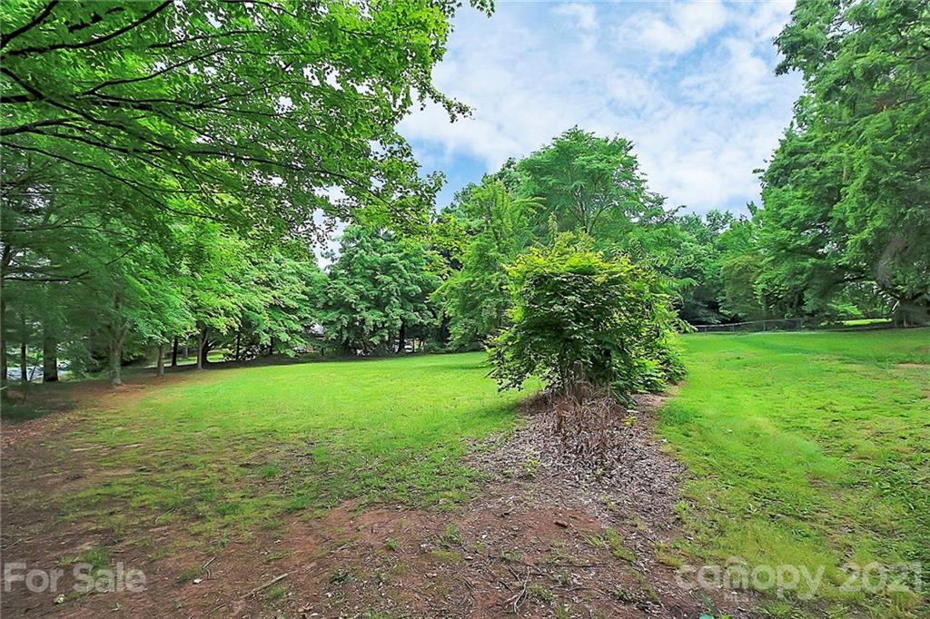 2101 Stallings Road Harrisburg, NC 28075 - Photo 44 of 45 a view of a trees with a yard