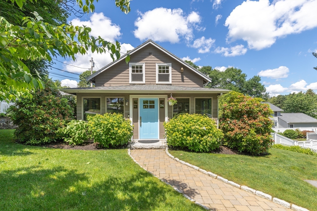 2 Parkwood Road Lynnfield, MA 01940 - Photo 1 of 37 a front view of a house with garden