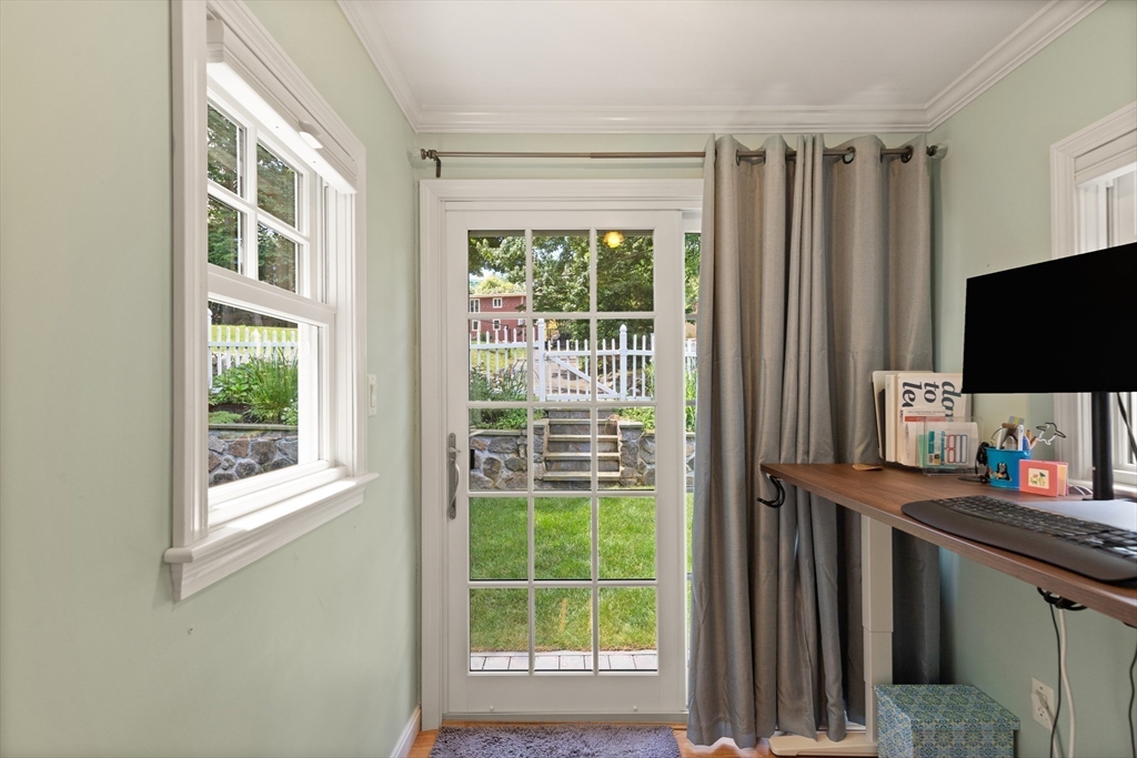 2 Parkwood Road Lynnfield, MA 01940 - Photo 16 of 37 a view of a workspace with a window and television