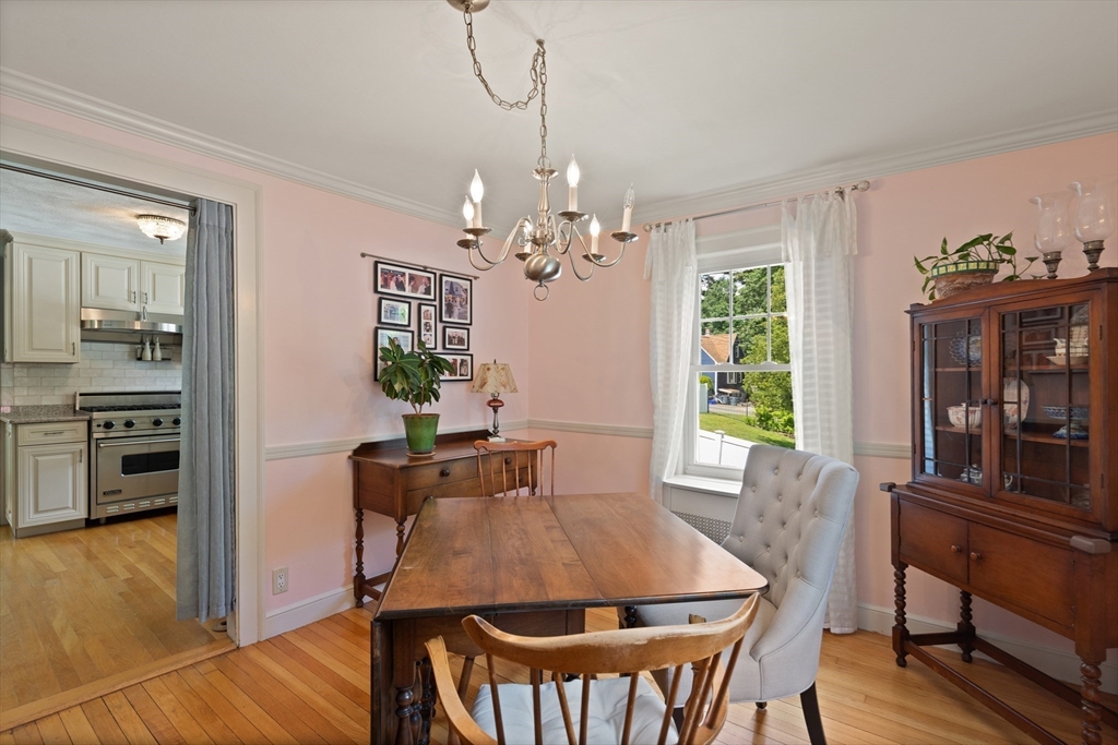 2 Parkwood Road Lynnfield, MA 01940 - Photo 17 of 37 a view of a dining room with furniture window and wooden floor