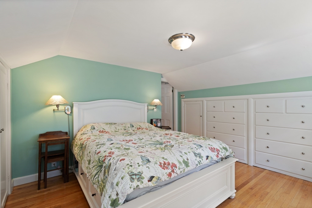 2 Parkwood Road Lynnfield, MA 01940 - Photo 24 of 37 a bedroom with a bed and a closet