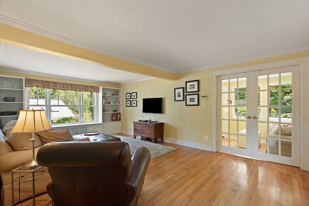2 Parkwood Road Lynnfield, MA 01940 - Photo 5 of 37 a living room with furniture large window and a flat screen tv