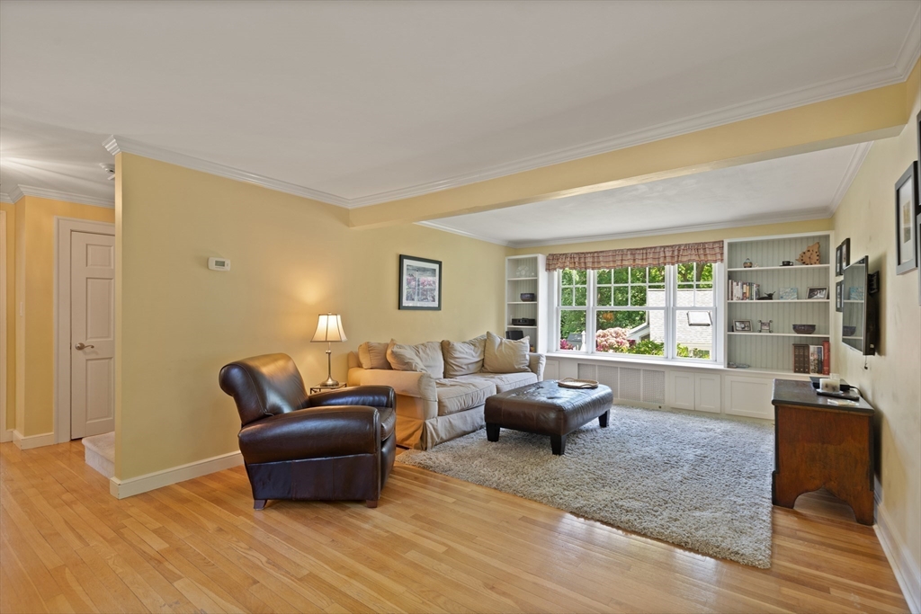 2 Parkwood Road Lynnfield, MA 01940 - Photo 6 of 37 a living room with furniture and a flat screen tv