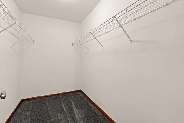 a view of a room with racks on the wall