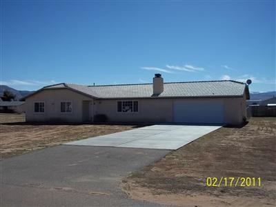 22269 Flathead Road Apple Valley, CA 92307 - Photo 1 of 1 a house view with a outdoor space