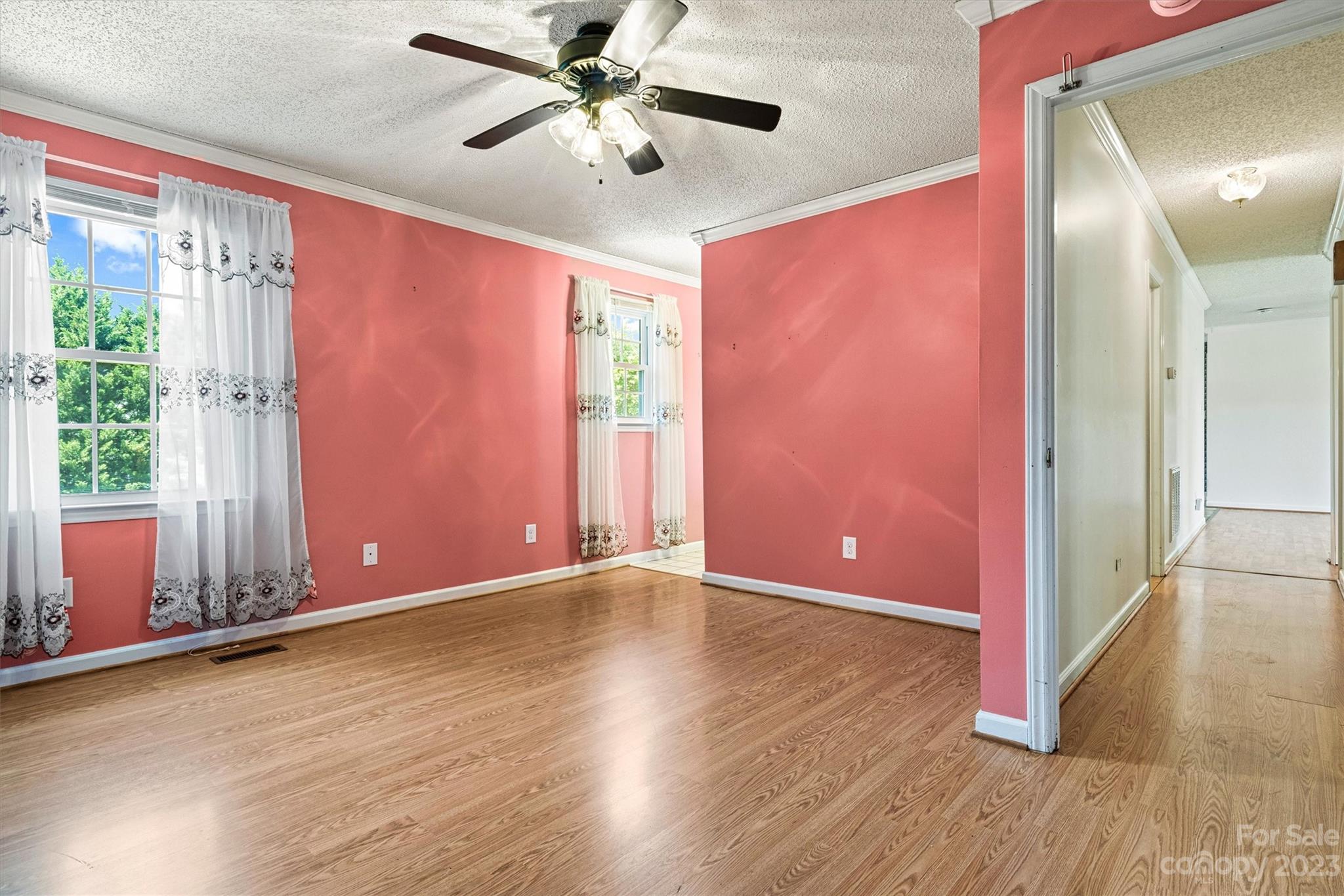 5327 Lee Cline Road Conover, NC 28613 - Photo 17 of 36 a view of a livingroom with a ceiling fan and window