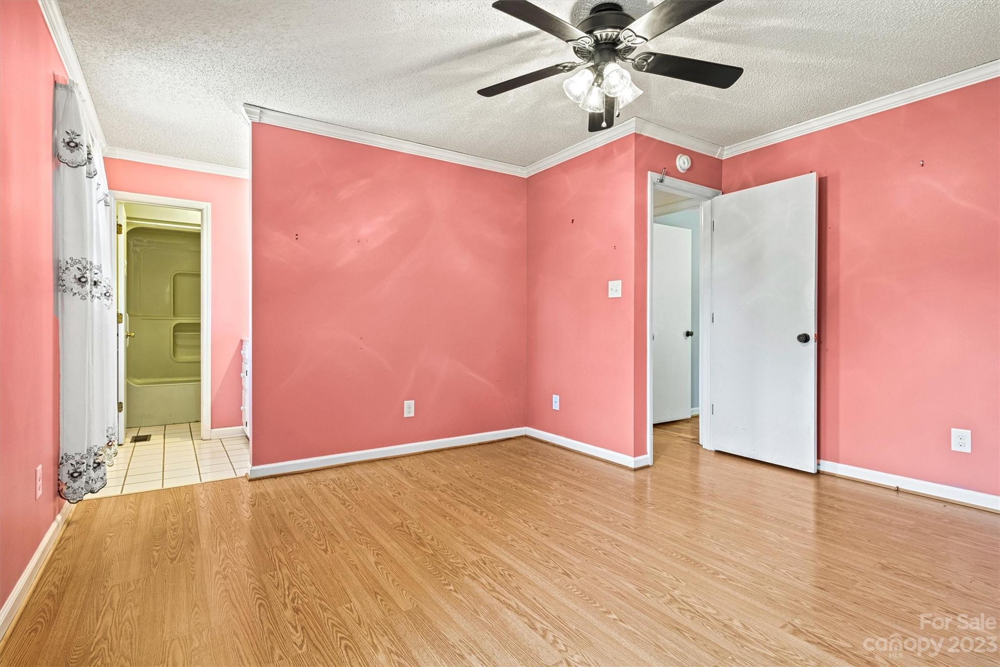 5327 Lee Cline Road Conover, NC 28613 - Photo 18 of 36 a view of an empty room with window and wooden floor