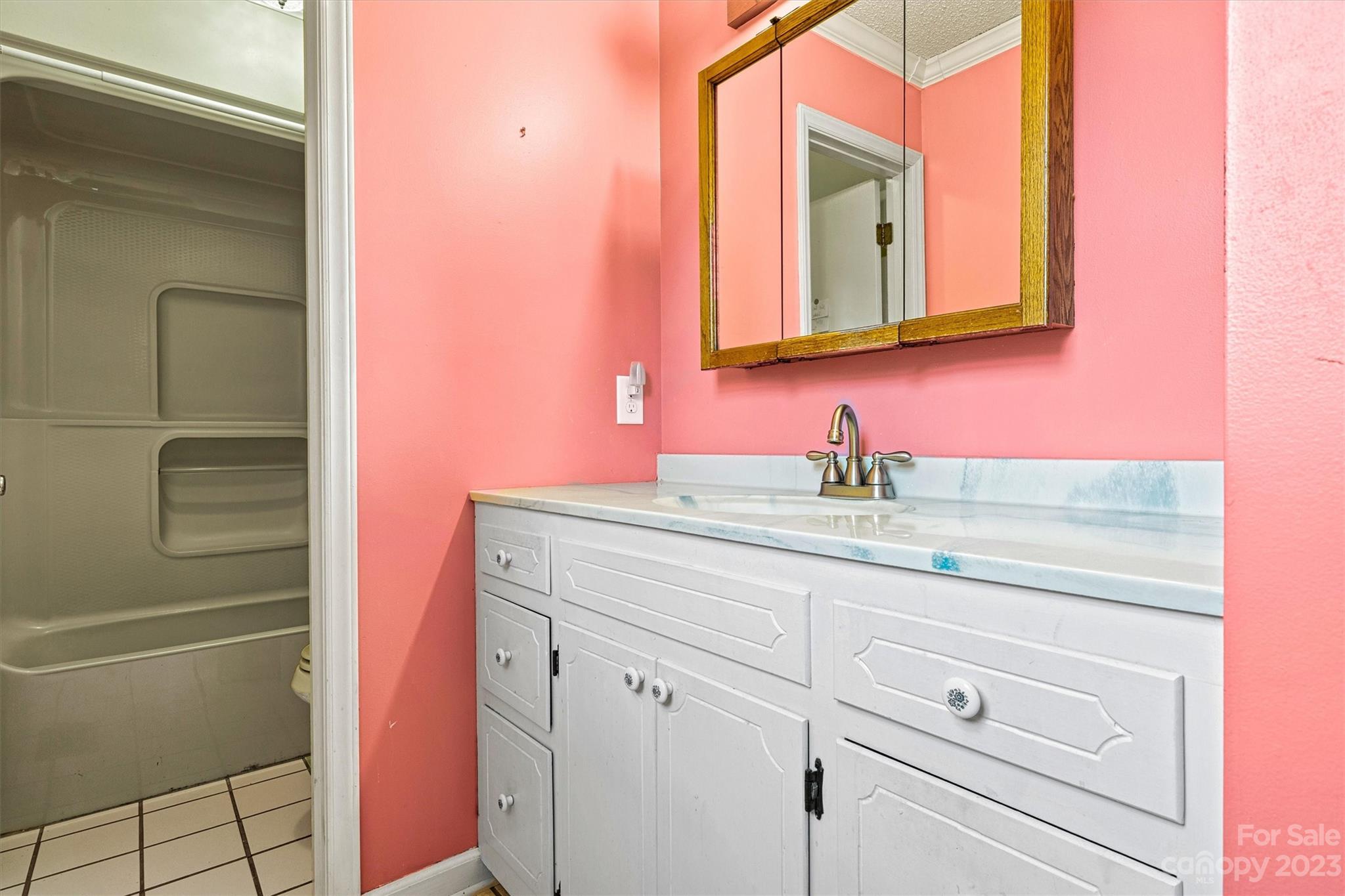5327 Lee Cline Road Conover, NC 28613 - Photo 20 of 36 a bathroom with a sink a vanity and a mirror