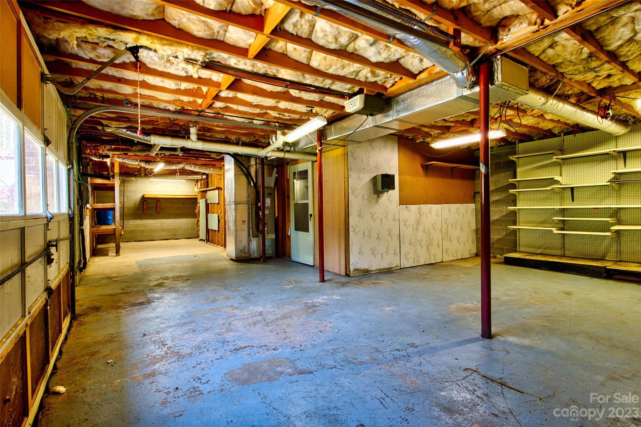 5327 Lee Cline Road Conover, NC 28613 - Photo 27 of 36 a view of an empty room with wooden floor and windows