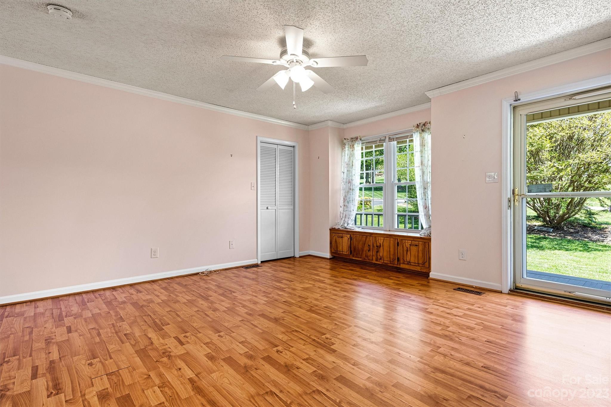 5327 Lee Cline Road Conover, NC 28613 - Photo 9 of 36 a view of an empty room with wooden floor and a window