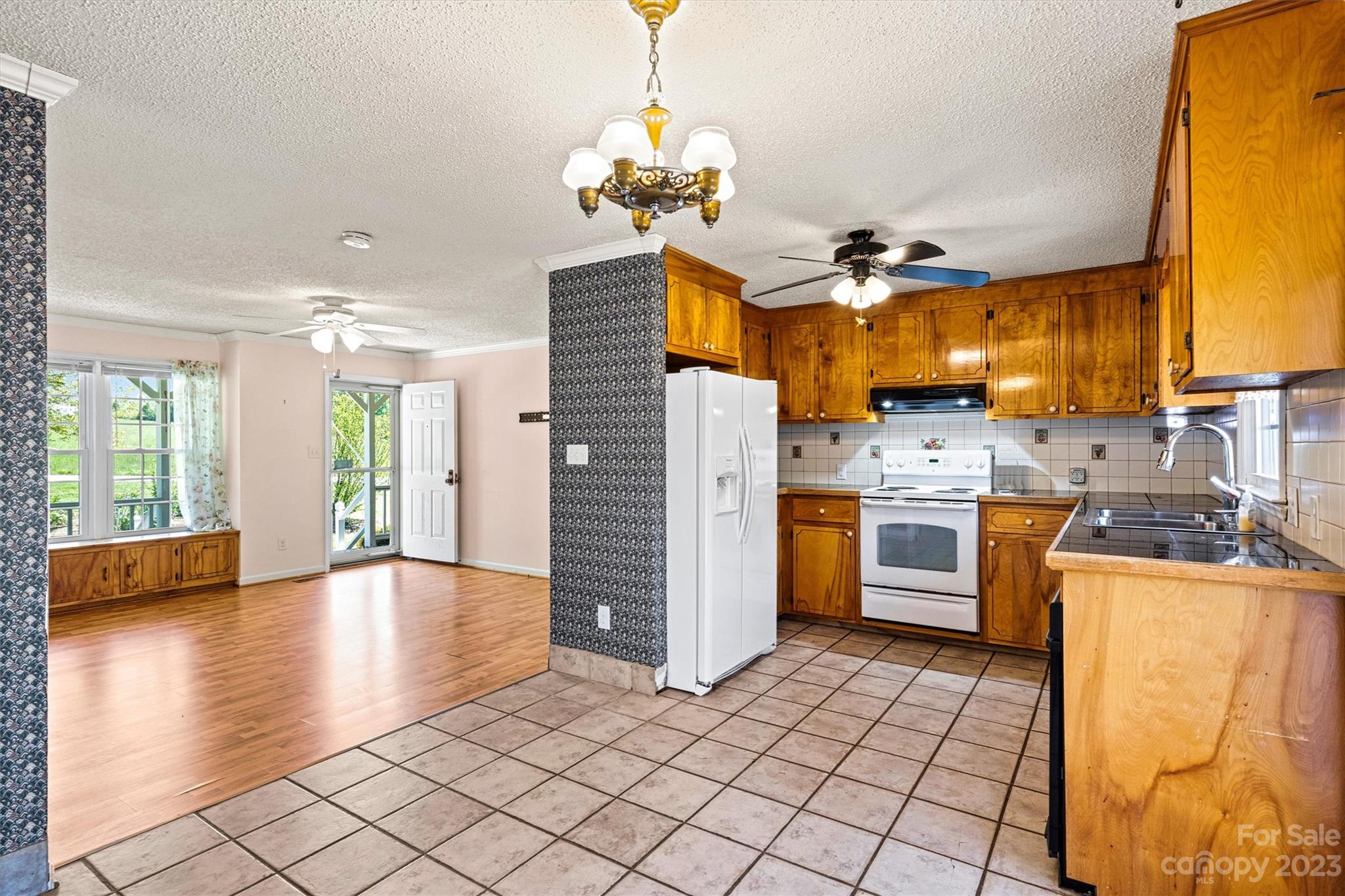 5327 Lee Cline Road Conover, NC 28613 - Photo 10 of 36 a view of kitchen with stainless steel appliances kitchen island granite countertop a refrigerator and a stove top oven