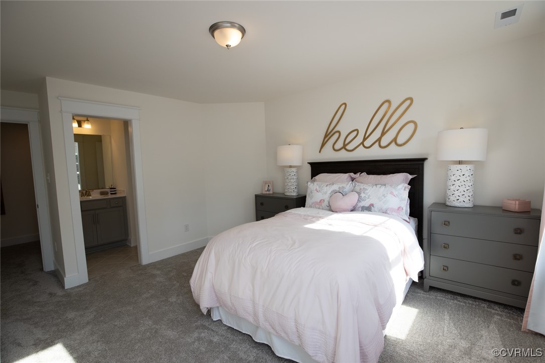 9106 Copplestone Road Chesterfield, VA 23832 - Photo 30 of 49 a bedroom with a bed and a window