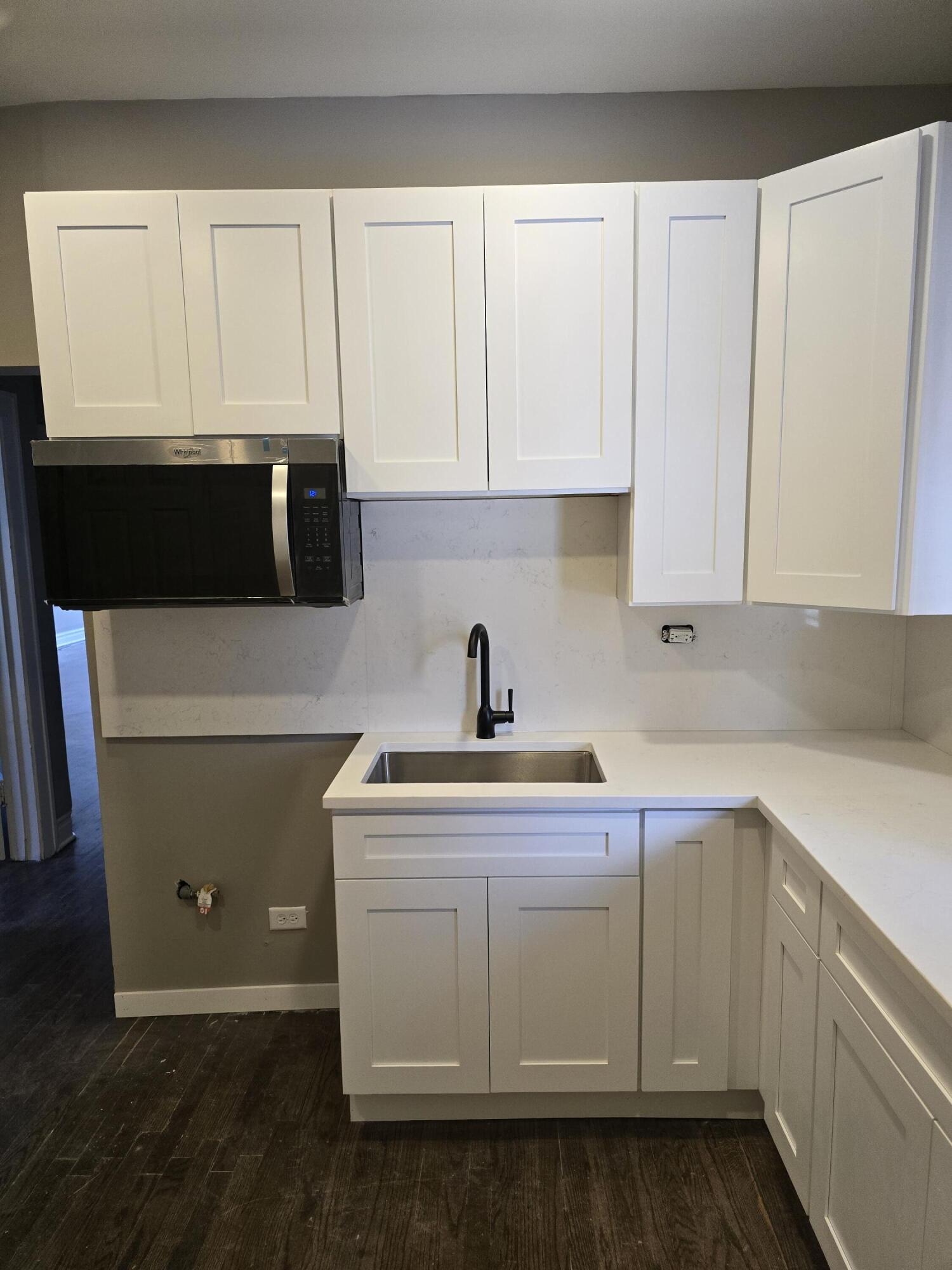1168 Fillmore Street Gary, IN 46407 - Photo 6 of 22 a kitchen with a sink and cabinets