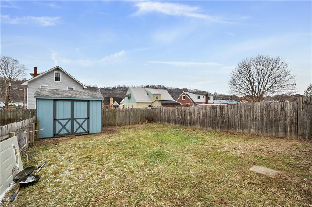 744 Lincoln Avenue Springdale, PA 15144 - Photo 25 of 26 a front view of a house with a yard