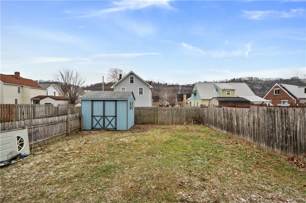 744 Lincoln Avenue Springdale, PA 15144 - Photo 26 of 26 a view of a house with a wooden fence