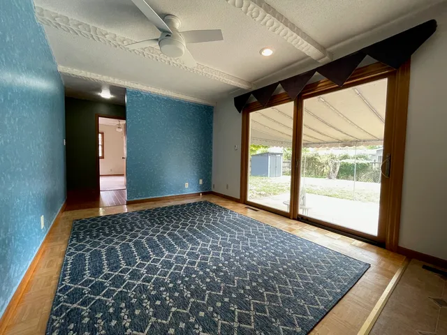 a view of an empty room with a window