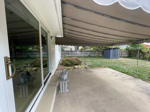 a view of a backyard with a garden