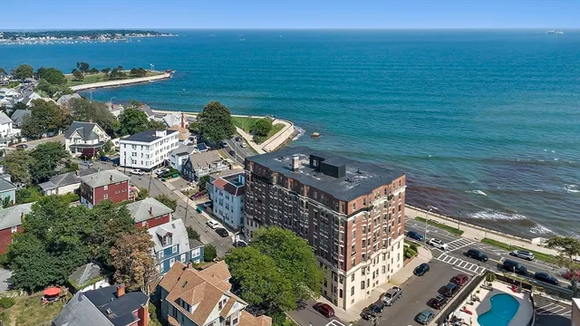 a view of a lake with a building in the background